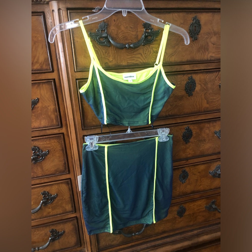 2 piece NWT matching short skirt, crop top.